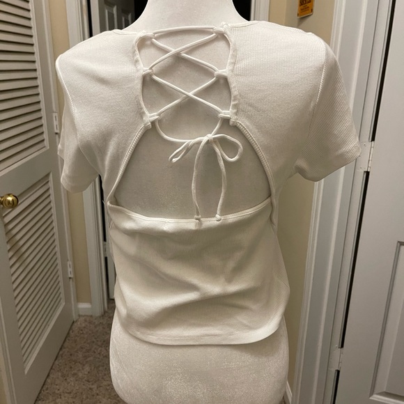 Fred Meyer cute white crop top with lace up back. Size L but fits like M. - Picture 3 of 4